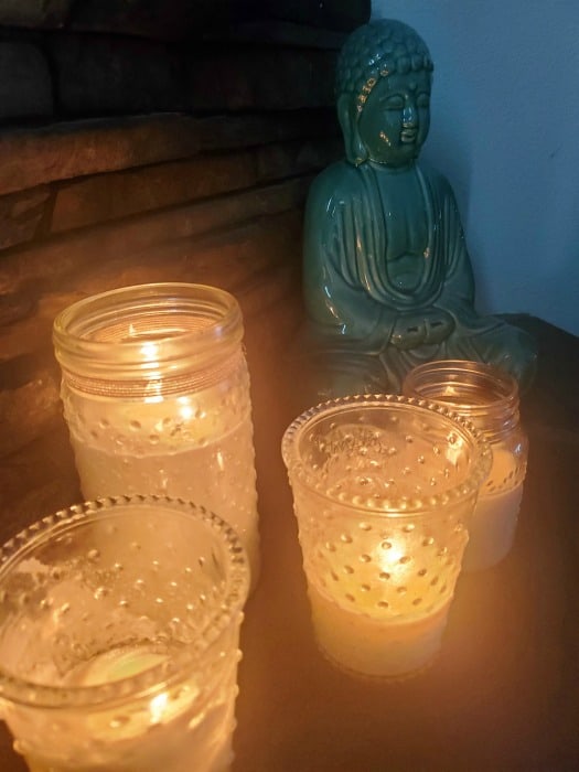 https://www.tammileetips.com/wp-content/uploads/2020/12/Buddha-by-Candlelight.jpg