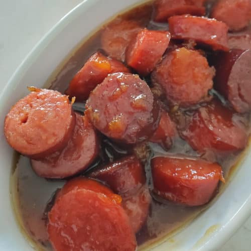 https://www.tammileetips.com/wp-content/uploads/2023/01/Crockpot-Bourbon-Glazed-Kielbasa-500x500.jpg